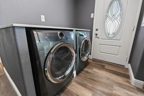 a utility room with dryer and washer