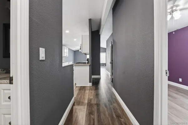 a view of a bathroom from the hallway