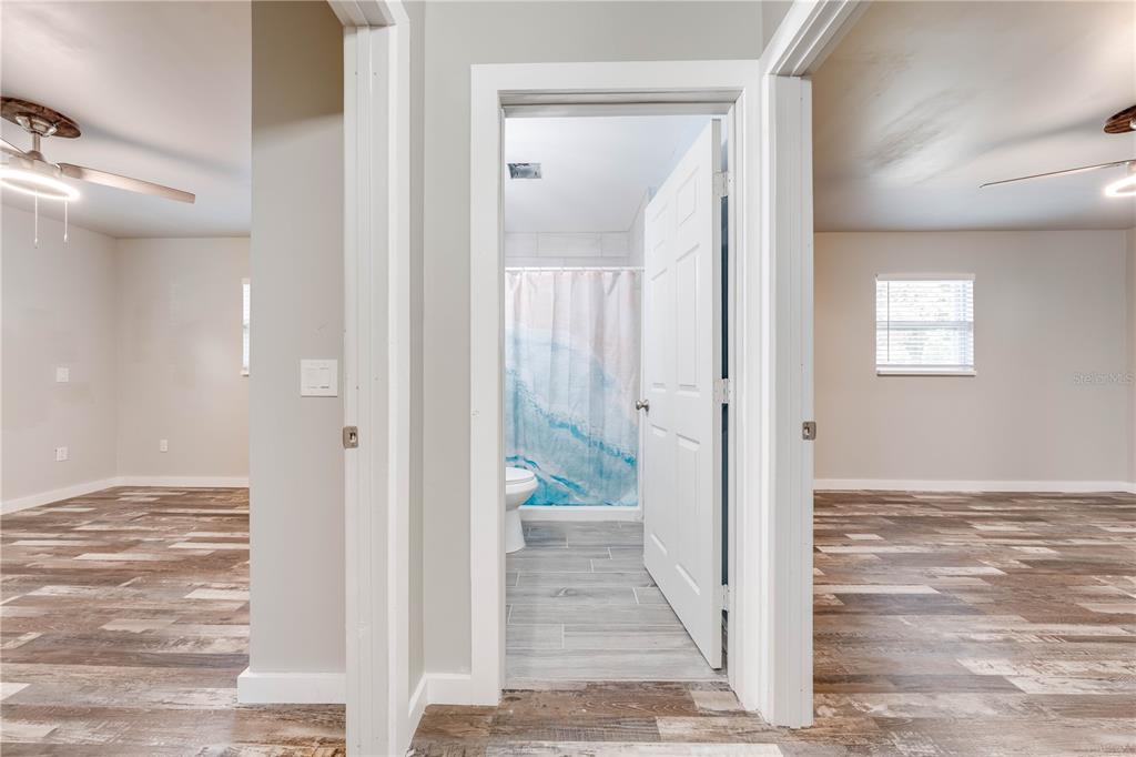 150 North Post Road Kenansville, FL 34739 - Photo 23 of 42 a view of a bathroom from a hallway