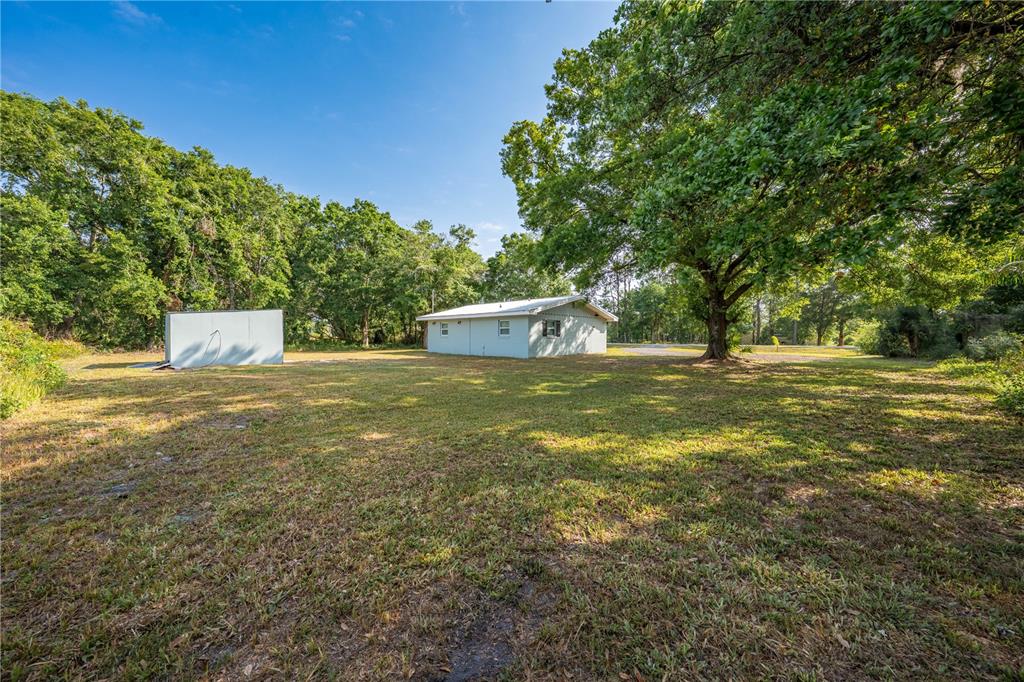 150 North Post Road Kenansville, FL 34739 - Photo 32 of 42 a view of a tree with a yard
