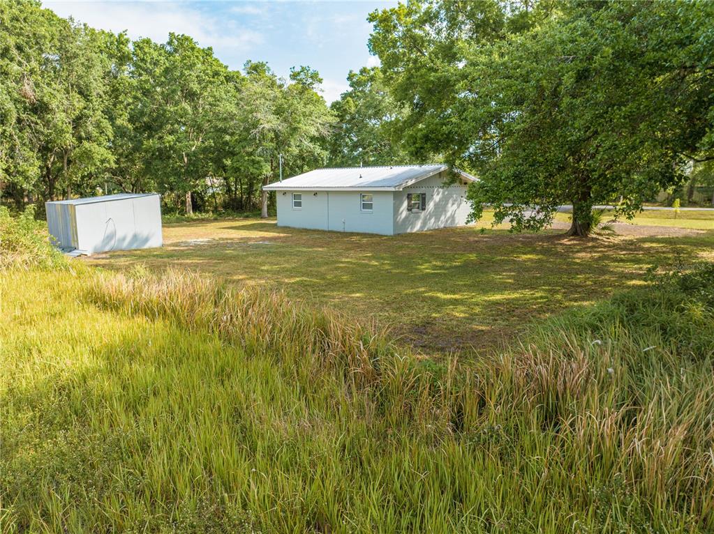 150 North Post Road Kenansville, FL 34739 - Photo 35 of 42 a house view with a outdoor space