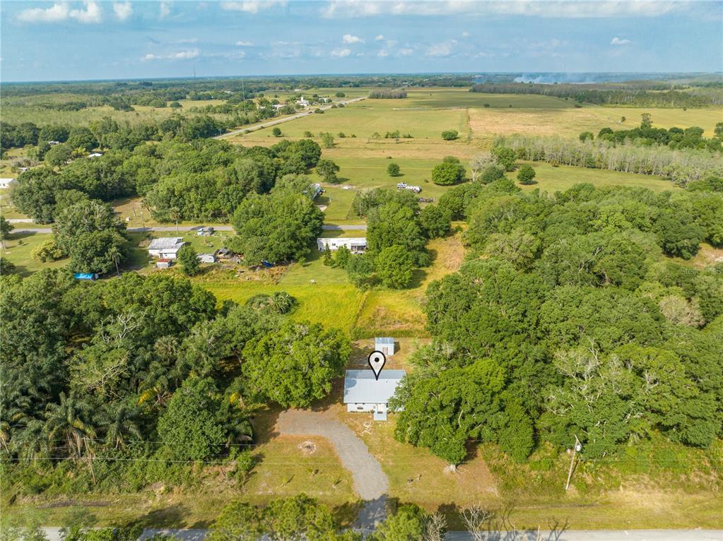 150 North Post Road Kenansville, FL 34739 - Photo 41 of 42 a view of a yard with an ocean