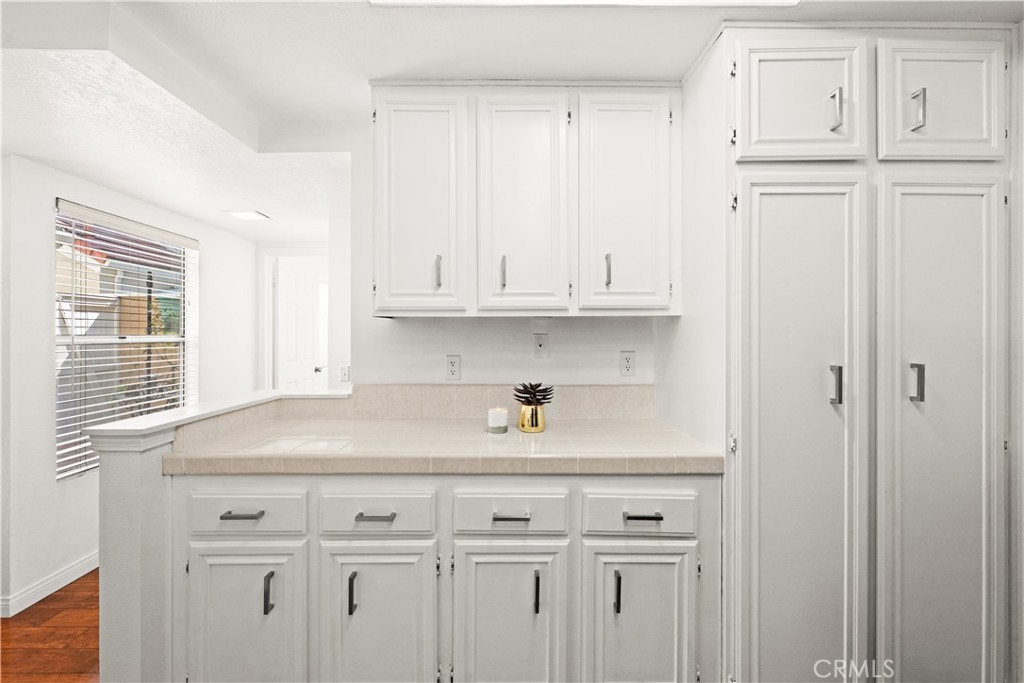 16 Wellesley, Unit 2 Irvine, CA 92612 - Photo 18 of 55 a view of white cabinets