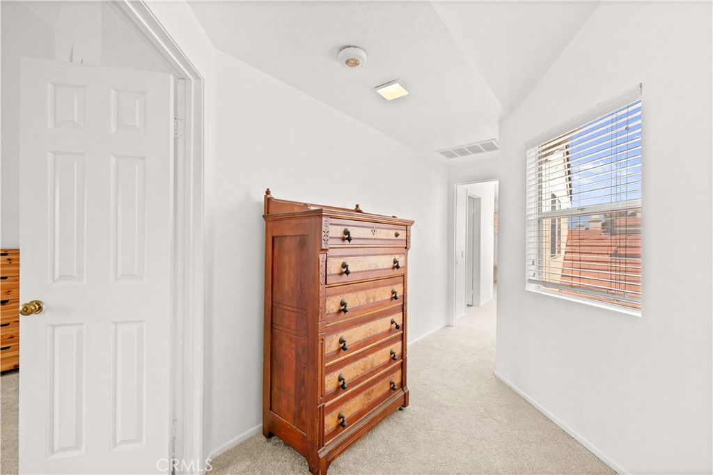 16 Wellesley, Unit 2 Irvine, CA 92612 - Photo 25 of 55 a view of walk in closet with empty racks