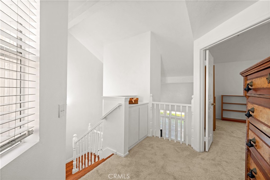 16 Wellesley, Unit 2 Irvine, CA 92612 - Photo 26 of 55 a view of a hallway with entryway and stairs