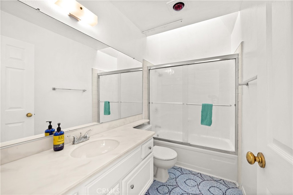 16 Wellesley, Unit 2 Irvine, CA 92612 - Photo 29 of 55 a bathroom with a sink and a shower