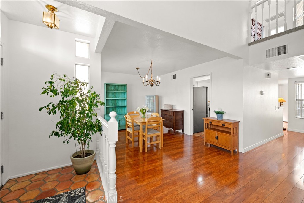 16 Wellesley, Unit 2 Irvine, CA 92612 - Photo 10 of 55 a living room with furniture and a potted plant