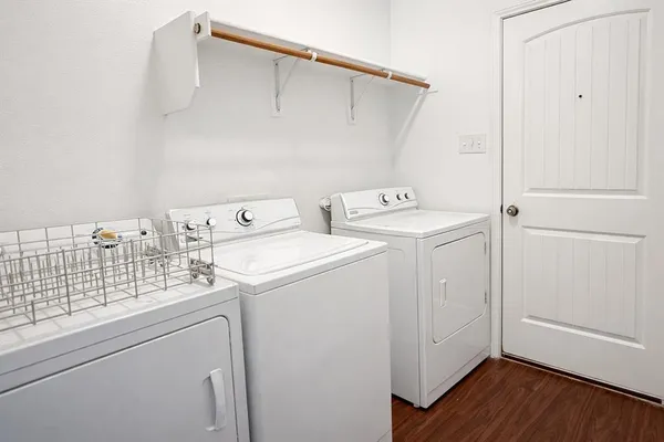 a utility room with dryer and washer