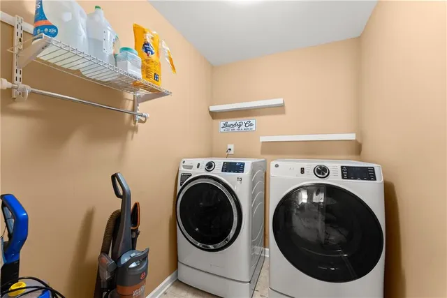 a utility room with dryer and washer