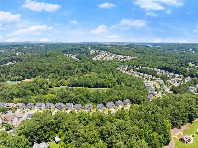 an aerial view of a city with lots of residential buildings