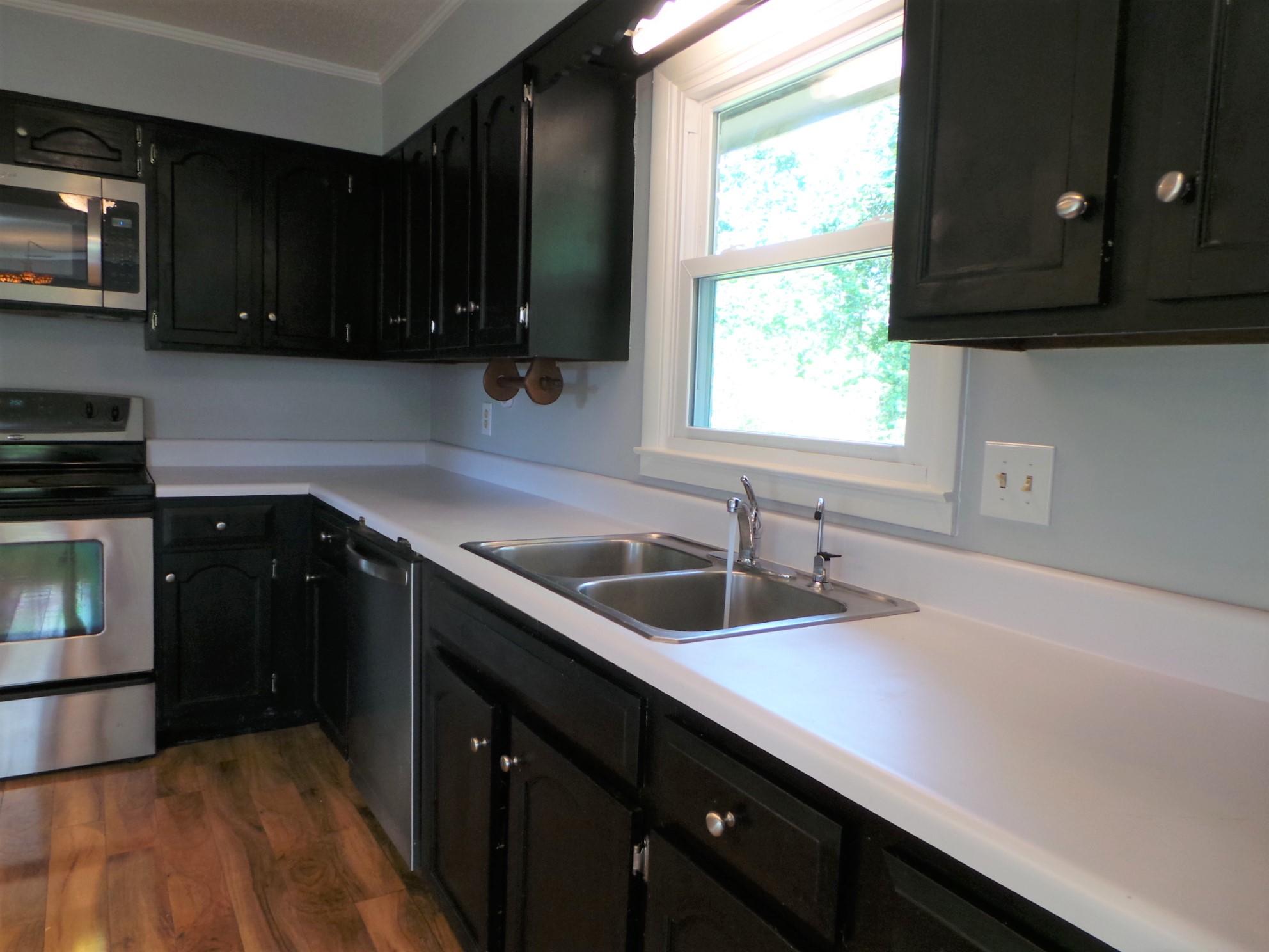 1029 Amersham Road Kingsport, TN 37660 - Photo 11 of 73 KITCHEN LOOKS OUT OVER BACK WOODS