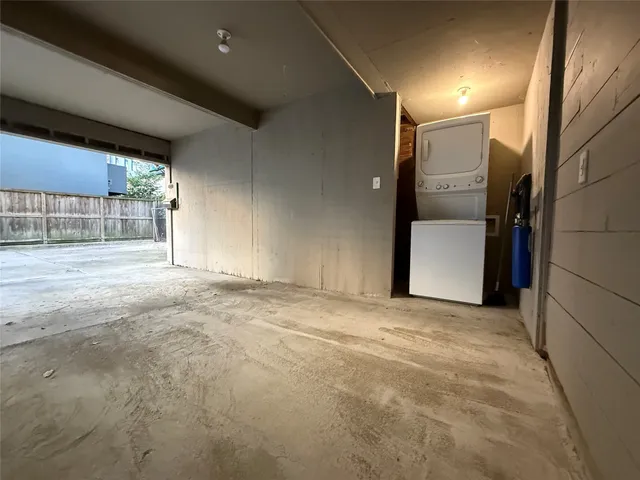 a view of an empty room with a fireplace