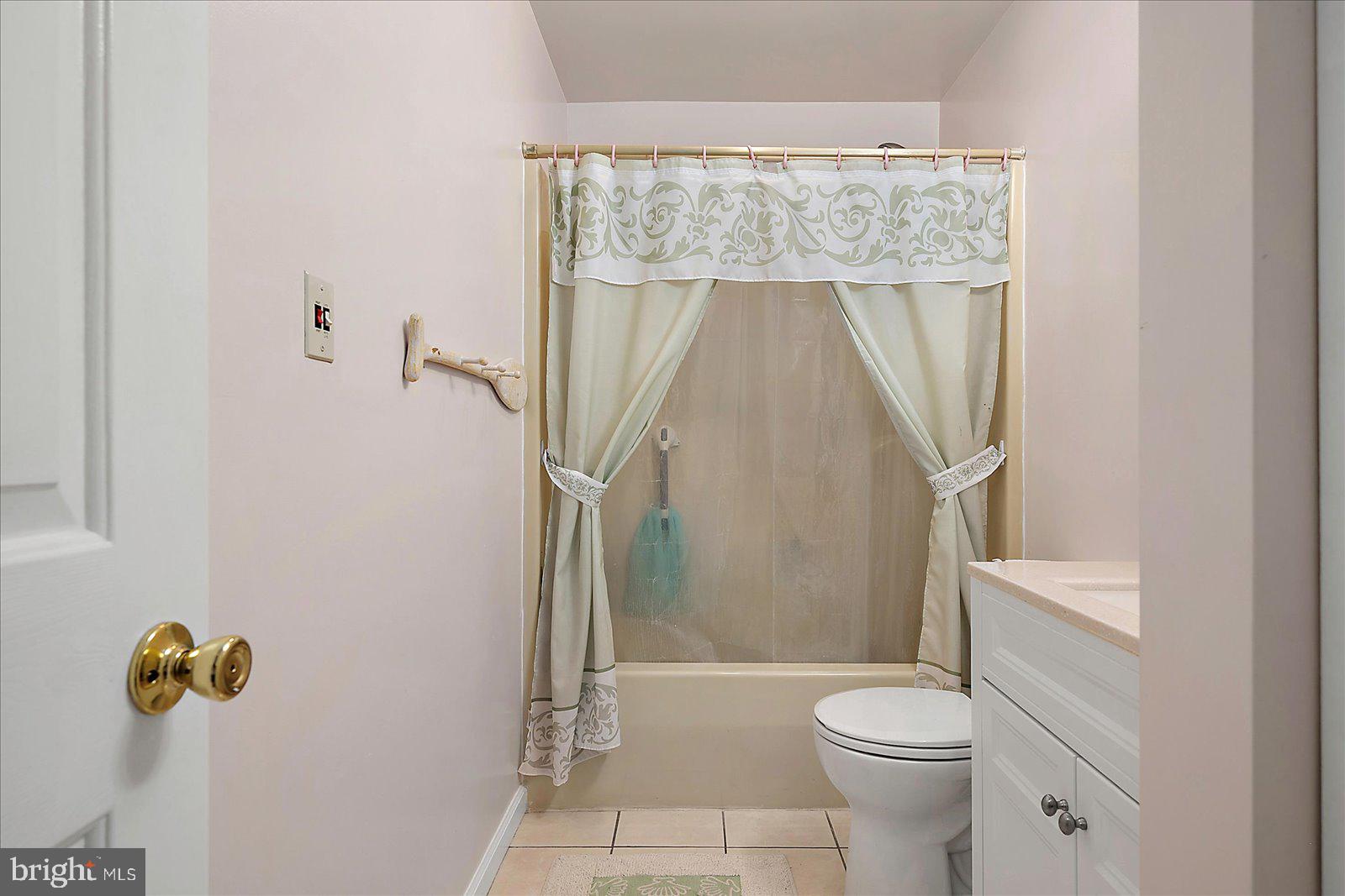 101 Sandyhook Road Ocean Pines, MD 21811 - Photo 31 of 64 a bathroom with a toilet and a shower
