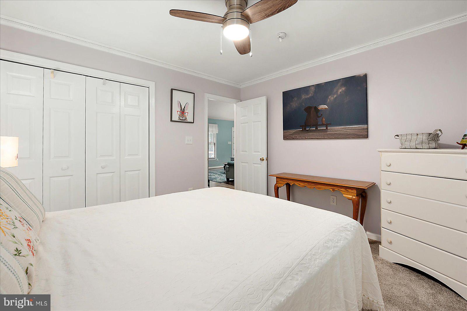 101 Sandyhook Road Ocean Pines, MD 21811 - Photo 34 of 64 a bedroom with a bed and a flat screen tv