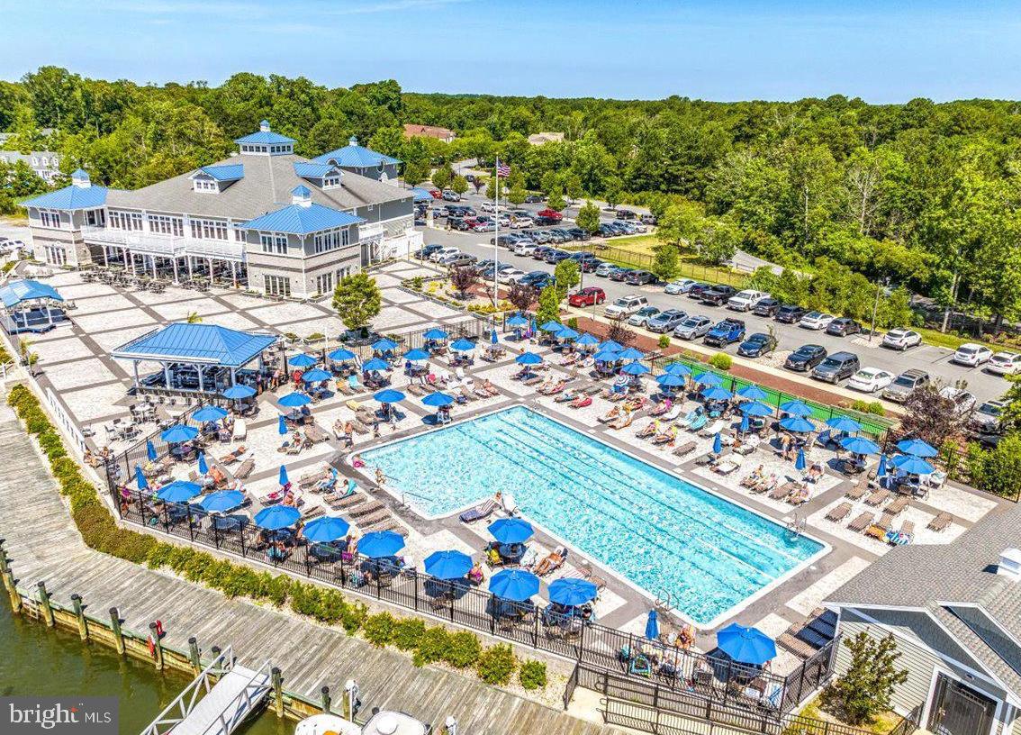 101 Sandyhook Road Ocean Pines, MD 21811 - Photo 45 of 64 an aerial view of residential houses with outdoor space and swimming pool