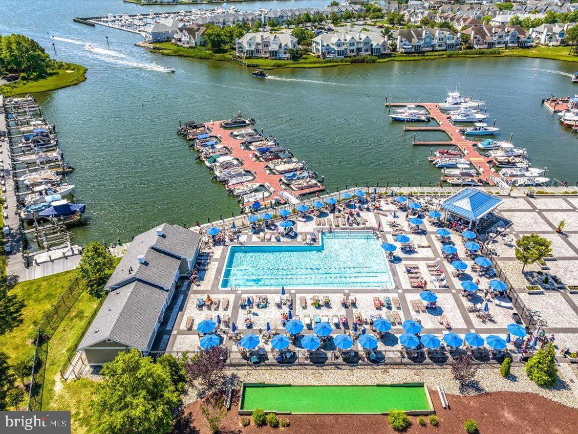 101 Sandyhook Road Ocean Pines, MD 21811 - Photo 47 of 64 an aerial view of a house with outdoor space lake view and boat