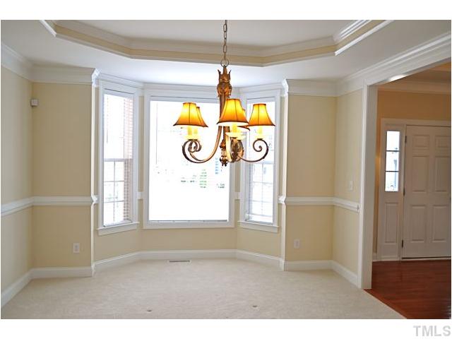 508 Elan Hall Road Cary, NC 27519 - Photo 4 of 17 Extensive trim work with upgraded lighting!