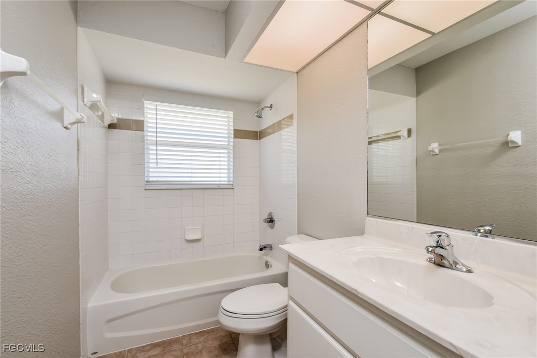 2810 Beloit Terrace North Port, FL 34286 - Photo 14 of 16 a bathroom with a sink toilet and shower