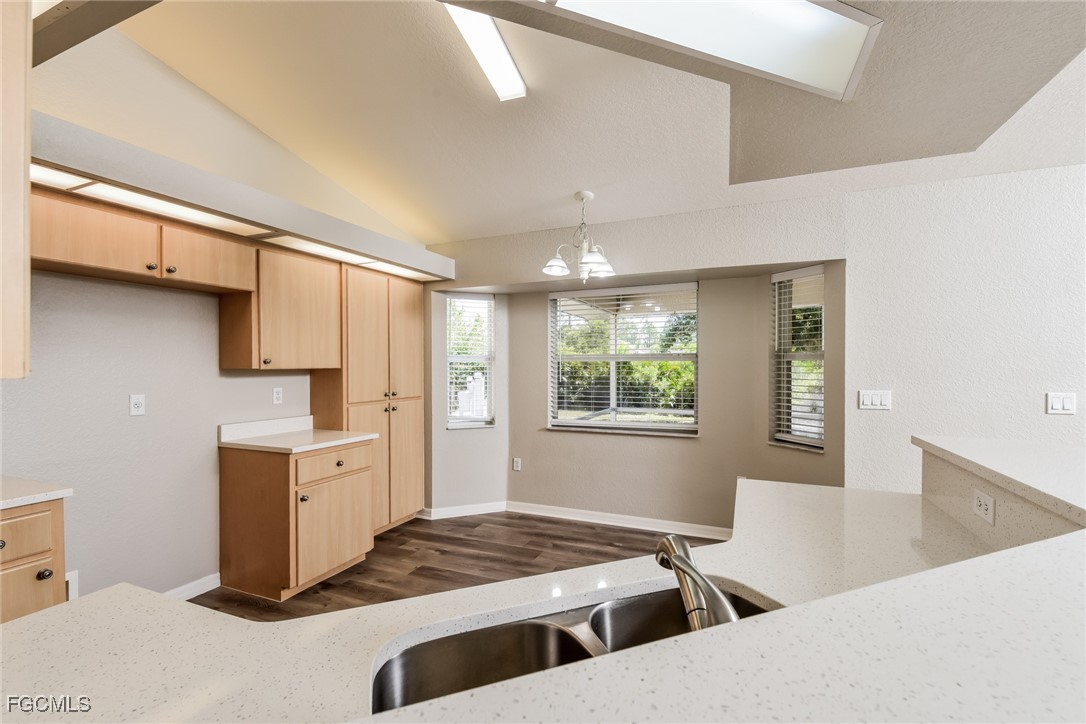 2810 Beloit Terrace North Port, FL 34286 - Photo 6 of 16 a open kitchen with stainless steel appliances granite countertop a stove and a refrigerator