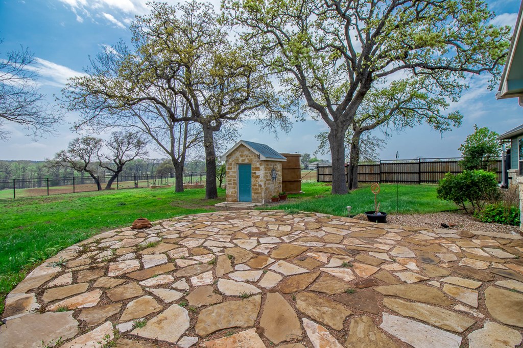 6515 Highway 27 Center Point, TX 78010 - Photo 25 of 48 a view of a house with a yard