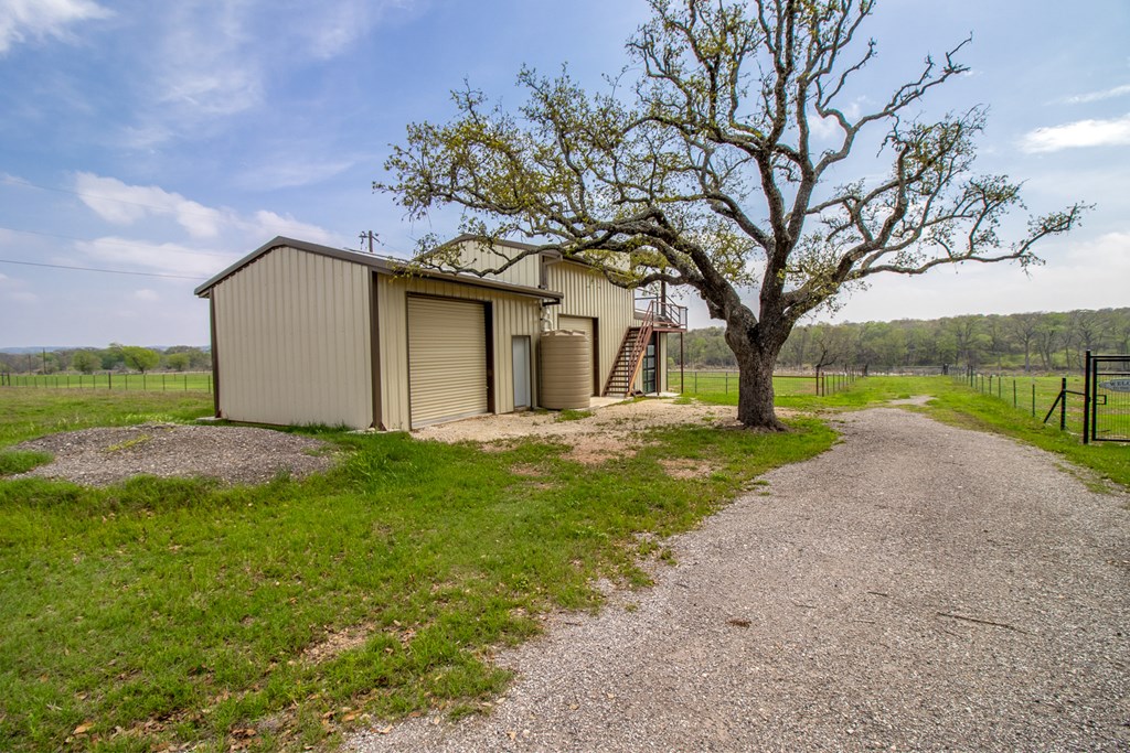 6515 Highway 27 Center Point, TX 78010 - Photo 36 of 48 a front view of house with yard and green space