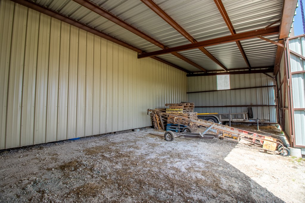 6515 Highway 27 Center Point, TX 78010 - Photo 48 of 48 a backyard of a house with table and chairs