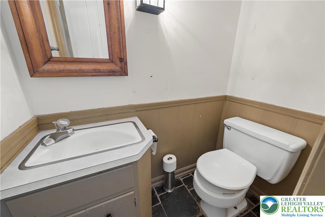 904 Parkway Road Allentown, PA 18104 - Photo 16 of 42 a bathroom with a sink and a toilet