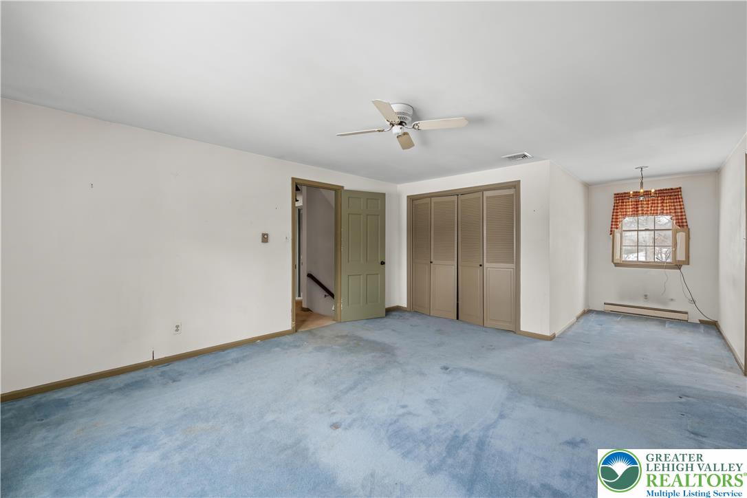 904 Parkway Road Allentown, PA 18104 - Photo 24 of 42 an empty room with windows and closet