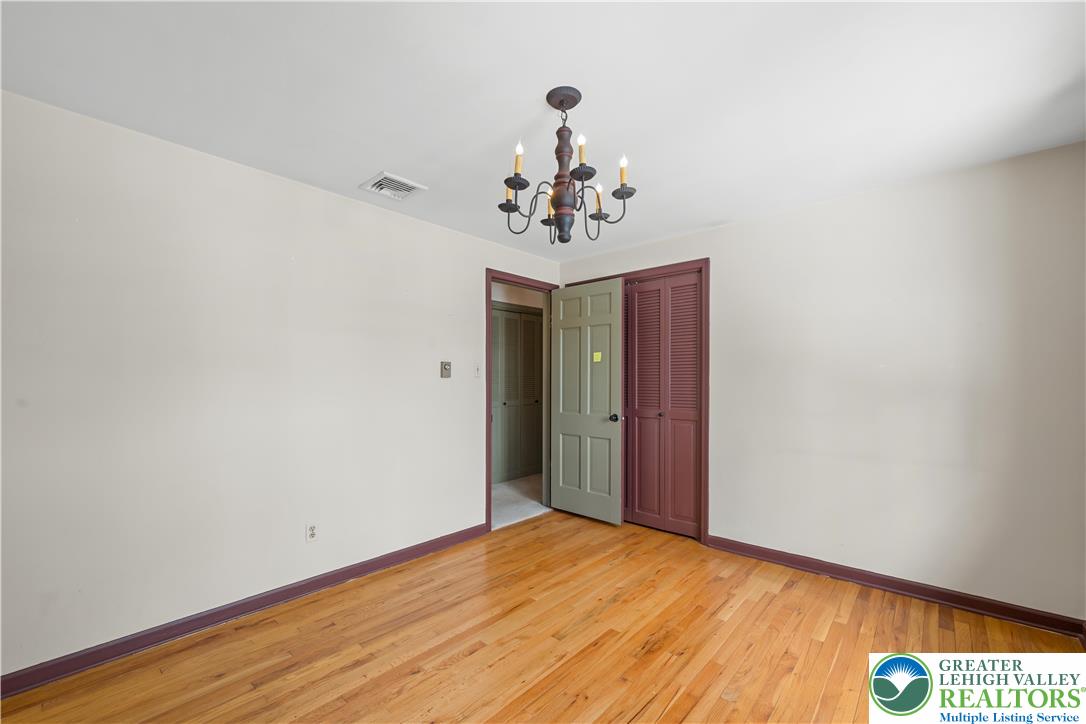 904 Parkway Road Allentown, PA 18104 - Photo 27 of 42 a view of a chandelier in big room