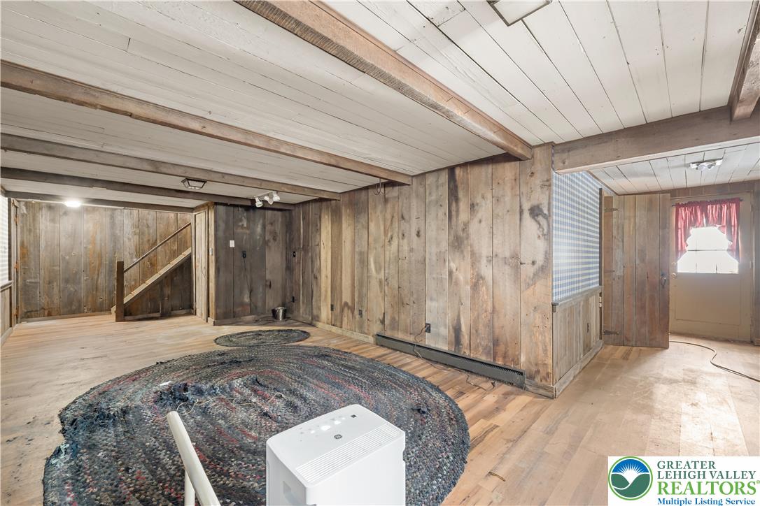 904 Parkway Road Allentown, PA 18104 - Photo 34 of 42 a view of a room with wooden floor and stairs