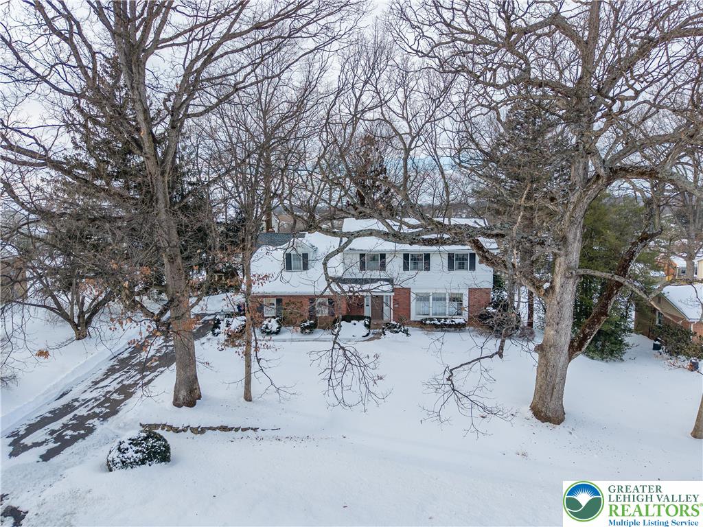 904 Parkway Road Allentown, PA 18104 - Photo 37 of 42 a view of a house with a yard covered in snow