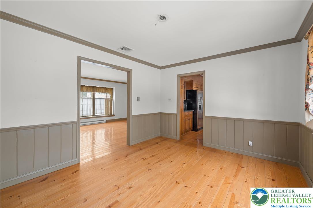 904 Parkway Road Allentown, PA 18104 - Photo 7 of 42 a view of empty room with wooden floor