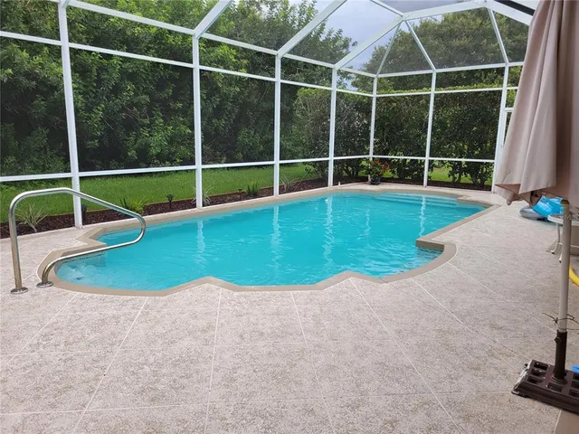 a view of a room with a sink and swing