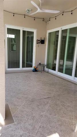 a view of swimming pool with a lounge chair