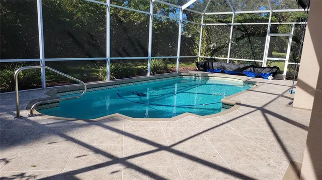 a view of a house with backyard