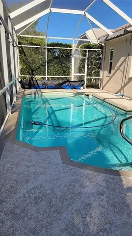 a sign that is on a brick wall