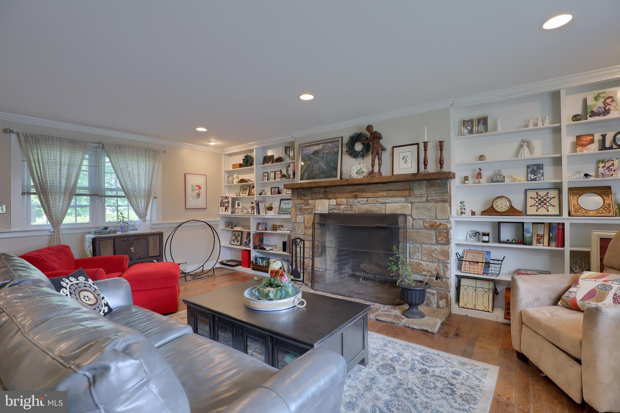 1296 Reading Road Denver, PA 17517 - Photo 8 of 50 Living Room w/ stone wood-burning fireplace