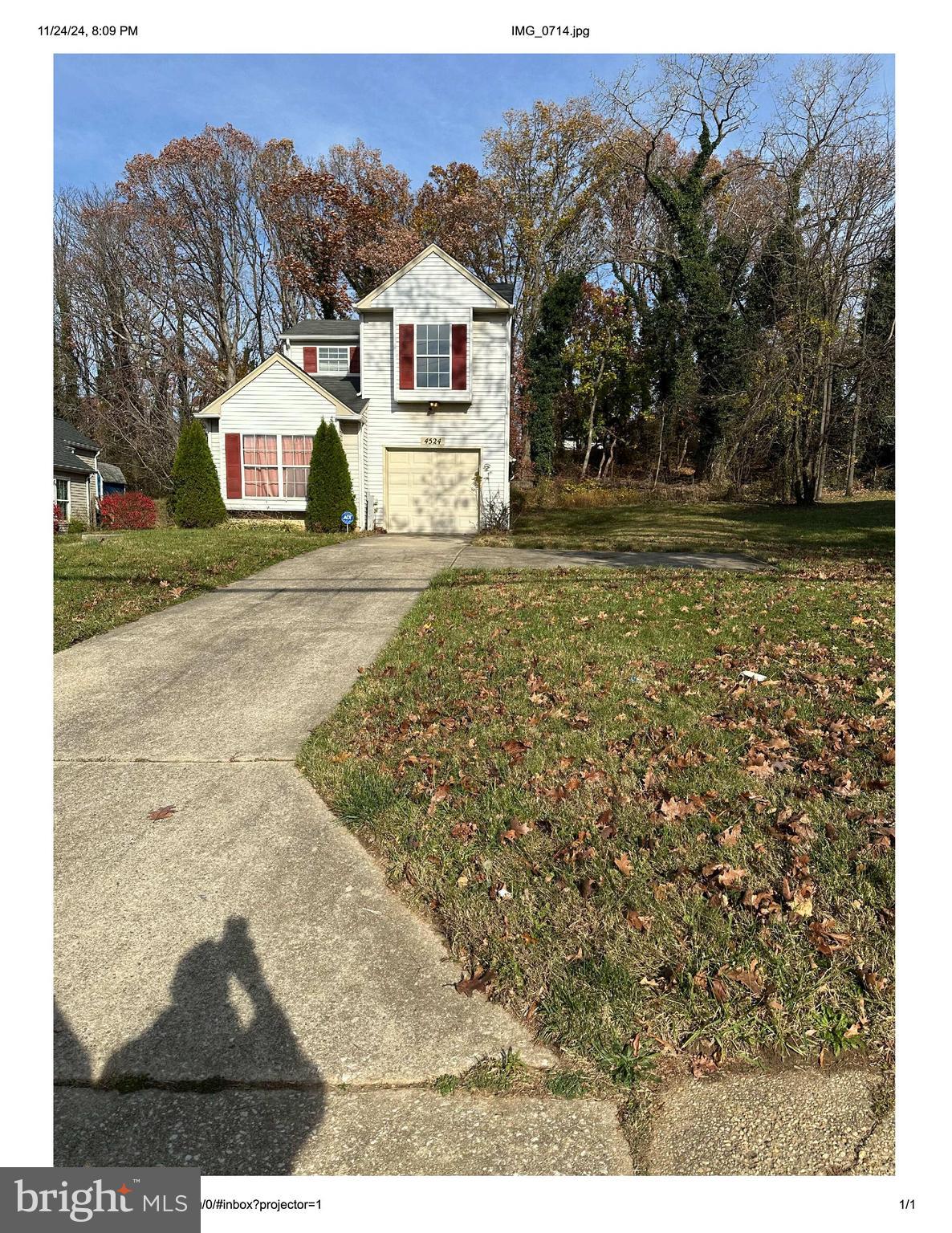 4524 St Thomas Avenue Baltimore, MD 21206 - Photo 1 of 7 a view of a yard in front of a house