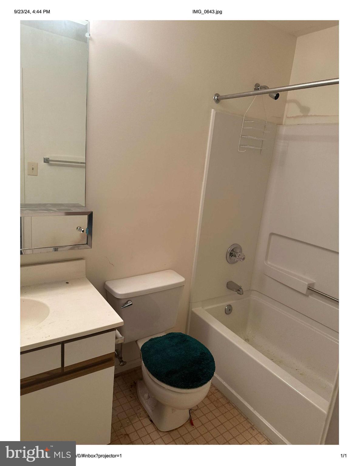 4524 St Thomas Avenue Baltimore, MD 21206 - Photo 2 of 7 a bathroom with a toilet a sink and bathtub