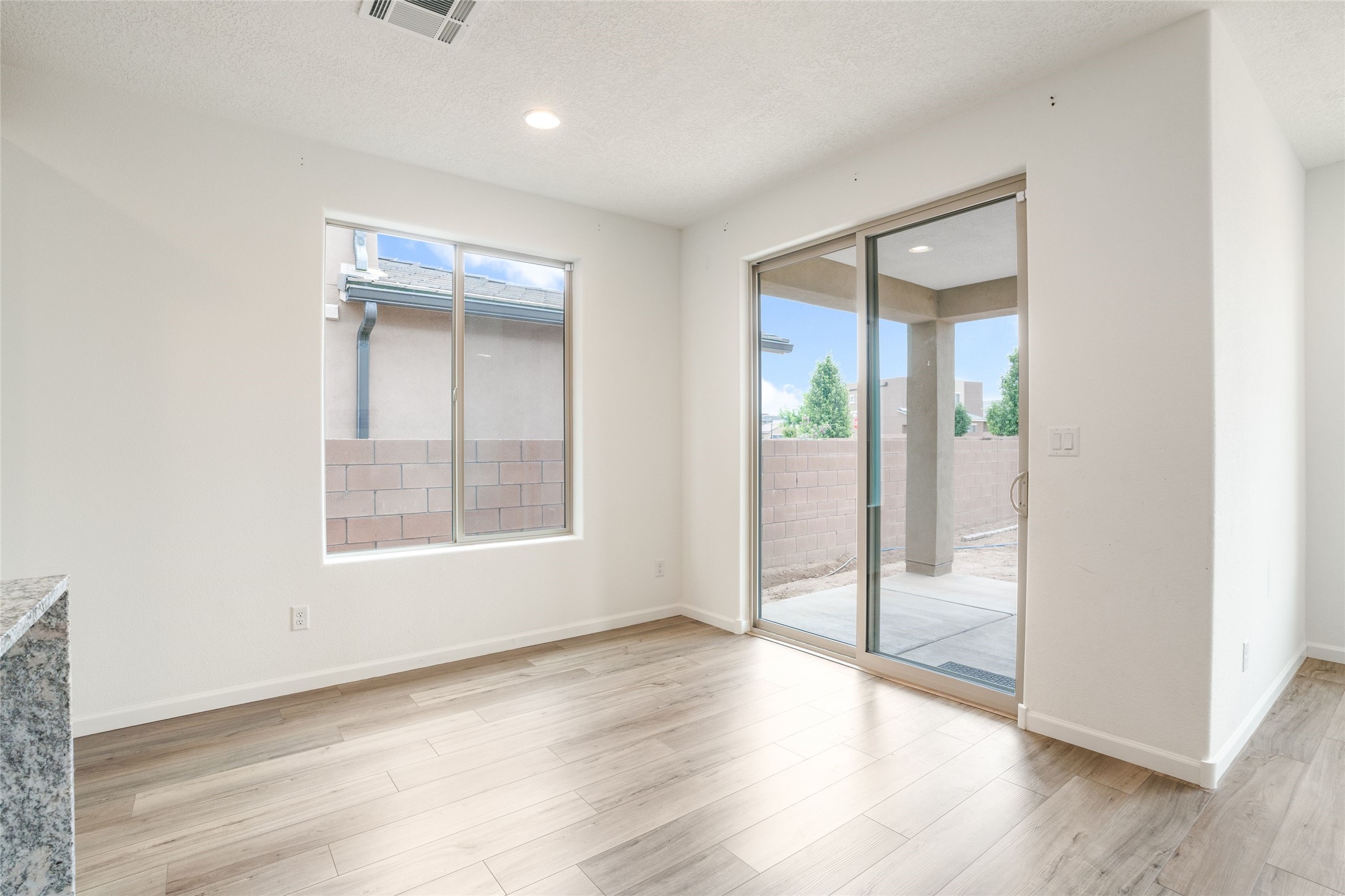 120 Mountaingem Loop Santa Fe, NM 87508 - Photo 10 of 31 Dining Area with out door access