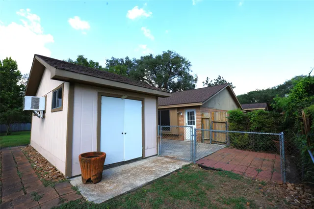 a house view with a garden space