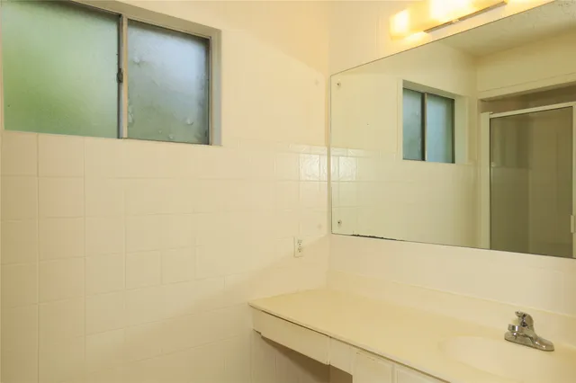 a bathroom with a bathtub and a sink