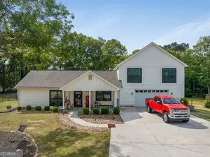 a car parked in front of a house