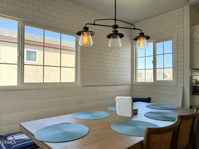 a bathroom with a sink toilet and mirror