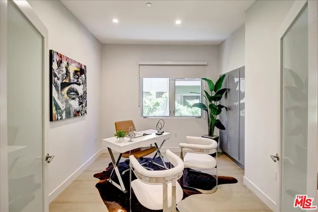 a view of a terrace with couches chairs