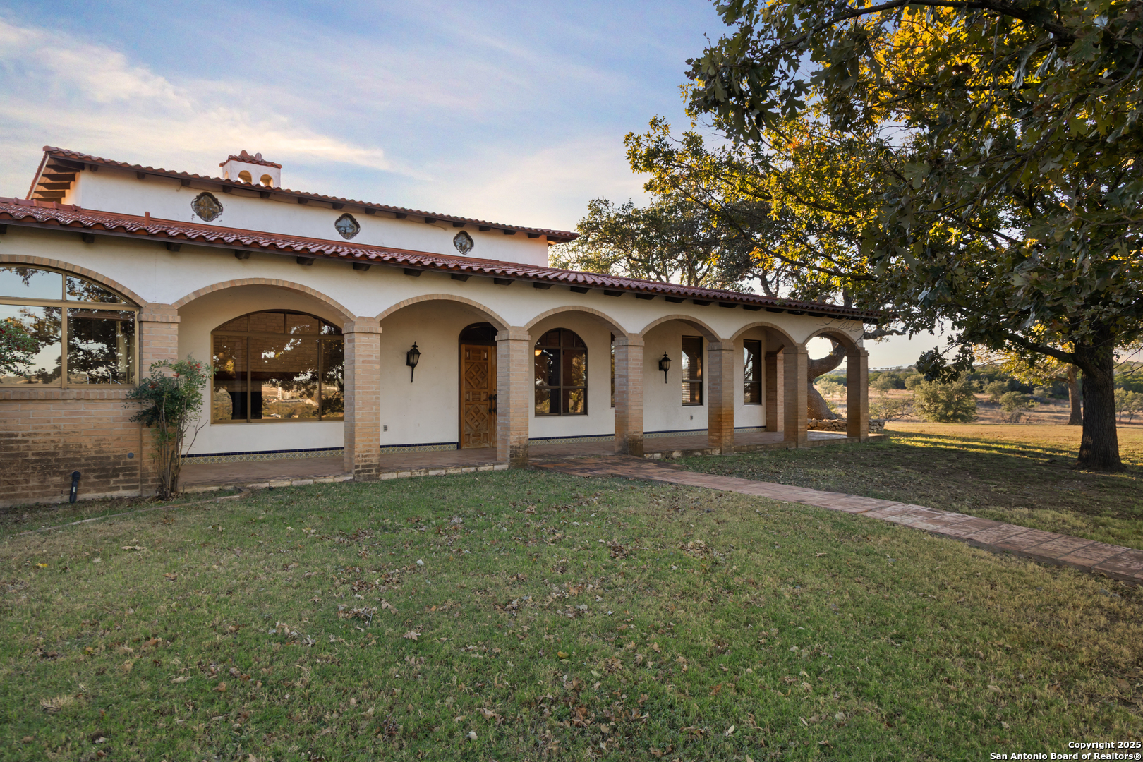 2650 Bandera Highway Kerrville, TX 78028 - Photo 18 of 50 a front view of a house with garden
