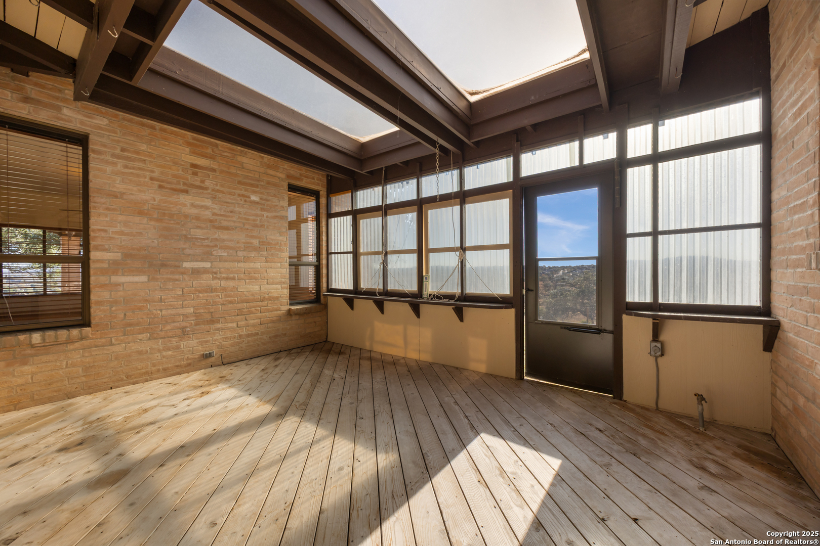 2650 Bandera Highway Kerrville, TX 78028 - Photo 39 of 50 a view of empty room with wooden floor