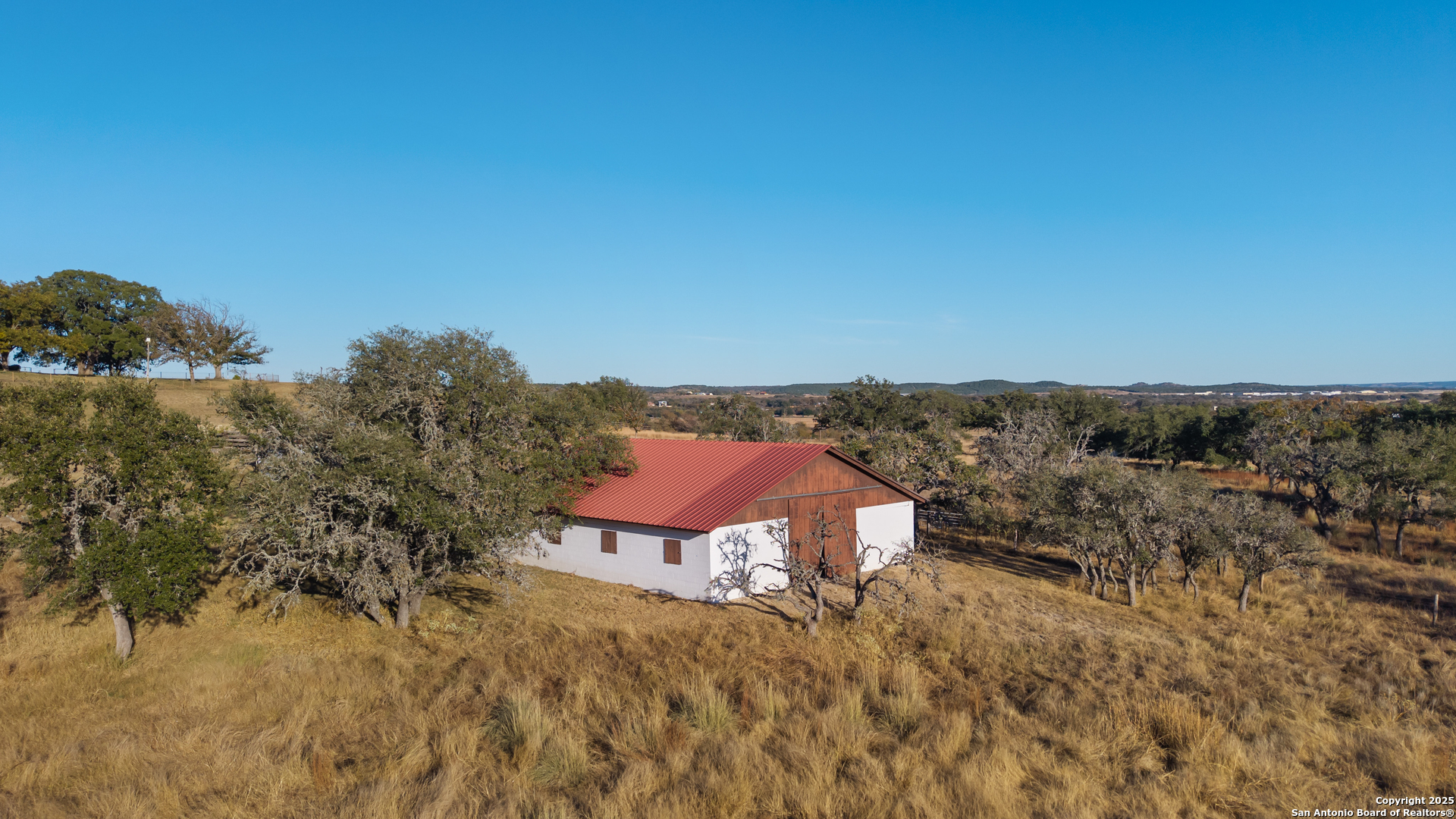 2650 Bandera Highway Kerrville, TX 78028 - Photo 47 of 50 a view of a houses with a yard