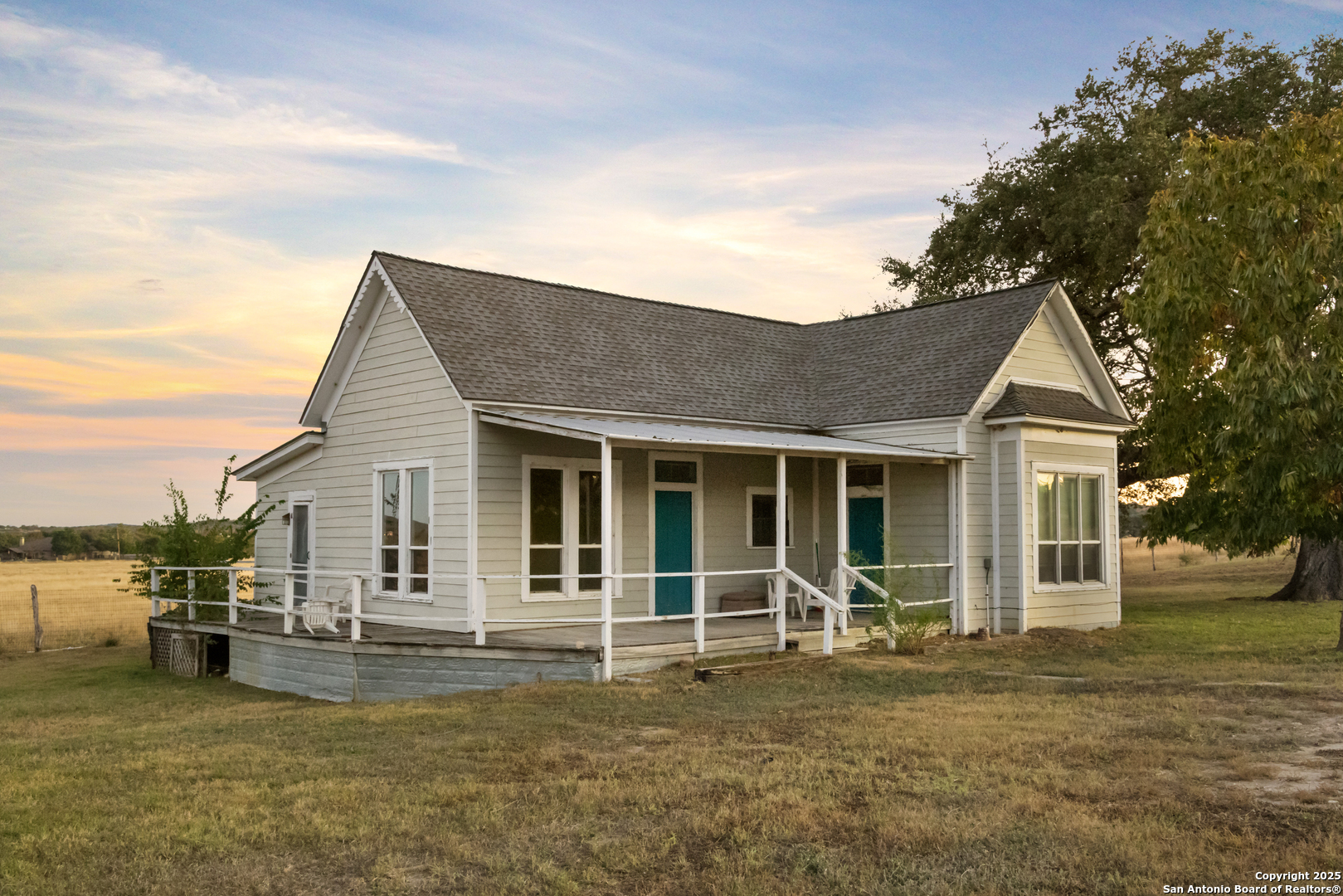 2650 Bandera Highway Kerrville, TX 78028 - Photo 50 of 50 a backyard of a house with table and chairs