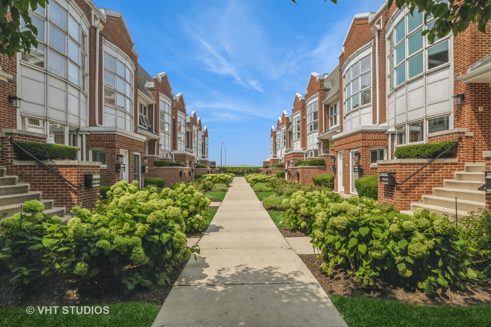 1328 South Federal Street, Unit G Chicago, IL 60605 - Photo 21 of 27 a view of a pathway with a buildings in the background